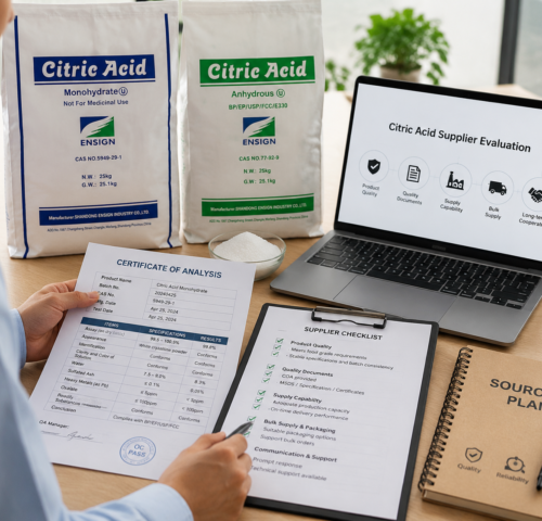 Food manufacturer reviewing citric acid supplier documents and quality specifications